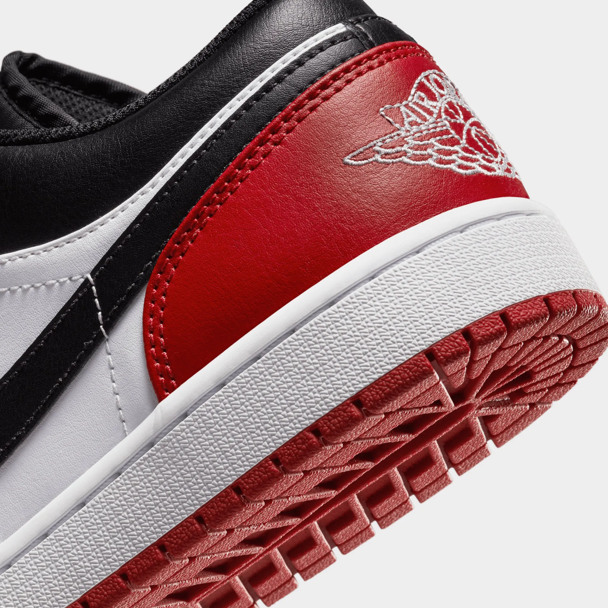 Jordan 1 Low White / Black - Varsity Red